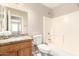 Full bathroom featuring tub with shower, toilet, and granite vanity at 12720 W Mandalay Ln, El Mirage, AZ 85335