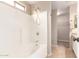 Clean bathroom featuring a shower-tub combo and neutral finishes, providing a functional and comfortable space at 12720 W Mandalay Ln, El Mirage, AZ 85335
