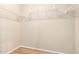Walk-in closet offering ample storage space with built-in shelving at 12720 W Mandalay Ln, El Mirage, AZ 85335