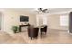 Inviting living room featuring tile flooring, recessed lighting, and stylish decor at 12720 W Mandalay Ln, El Mirage, AZ 85335