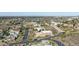 Aerial of neighborhood shows modern architecture blended within a desert landscape, with hills in the background at 1340 E Las Palmaritas Dr, Phoenix, AZ 85020