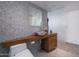 Modern bathroom with vessel sink, beautiful tilework, and custom wooden cabinets at 1340 E Las Palmaritas Dr, Phoenix, AZ 85020