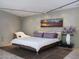 Bedroom features contemporary decor, a sliding glass door to a deck, and desert landscape views at 1340 E Las Palmaritas Dr, Phoenix, AZ 85020