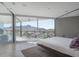 Bedroom features a sliding glass door to a deck with views of the surrounding mountains at 1340 E Las Palmaritas Dr, Phoenix, AZ 85020