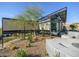 Modern home with a desert landscape featuring gravel, cacti and concrete accents at 1340 E Las Palmaritas Dr, Phoenix, AZ 85020