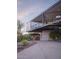Stunning contemporary home featuring a unique steel framework, xeriscaping, and desert vegetation at 1340 E Las Palmaritas Dr, Phoenix, AZ 85020