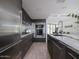 Stylish kitchen features modern appliances, sleek cabinetry, and granite countertops at 1340 E Las Palmaritas Dr, Phoenix, AZ 85020