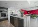 Well-lit kitchen with stainless steel appliances, granite countertops, and modern finishes at 1340 E Las Palmaritas Dr, Phoenix, AZ 85020