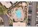 Aerial view showcasing a sparkling blue community pool with a spa, seating, and nearby parking at 13700 N Fountain Hills Blvd # 365, Fountain Hills, AZ 85268