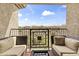 Relaxing outdoor balcony with comfortable seating, offering a perfect view of the community at 13700 N Fountain Hills Blvd # 365, Fountain Hills, AZ 85268