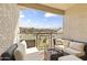 Relax on the covered balcony with comfortable seating and scenic views at 13700 N Fountain Hills Blvd # 365, Fountain Hills, AZ 85268