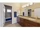Spacious bathroom featuring a double sink granite countertop and walk-in shower at 13700 N Fountain Hills Blvd # 365, Fountain Hills, AZ 85268