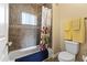 Cozy bathroom with tile shower and tub, featuring neutral colors and floral accents at 13700 N Fountain Hills Blvd # 365, Fountain Hills, AZ 85268