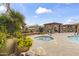 Relaxing community pool with a hot tub, lush landscaping, and shade, perfect for leisure at 13700 N Fountain Hills Blvd # 365, Fountain Hills, AZ 85268
