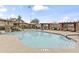 Resort-style pool with sun loungers, shade structures, and a waterfall feature for ultimate relaxation at 13700 N Fountain Hills Blvd # 365, Fountain Hills, AZ 85268