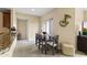 Dining area with table set, sliding glass doors to balcony, and an artful wall decoration at 13700 N Fountain Hills Blvd # 365, Fountain Hills, AZ 85268