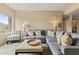 Open living room with comfortable seating, neutral color palette, and bright lamps at 13700 N Fountain Hills Blvd # 365, Fountain Hills, AZ 85268