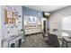 A well-lit lounge featuring comfortable seating, a television, and a selection of books and decor at 13700 N Fountain Hills Blvd # 365, Fountain Hills, AZ 85268