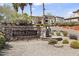 Attractive community signage at Four Peaks Condominium Homes, with a decorative rock facade and water feature at 13700 N Fountain Hills Blvd # 365, Fountain Hills, AZ 85268