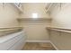 Spacious walk-in closet featuring custom built-ins and ample shelving for storage at 13700 N Fountain Hills Blvd # 365, Fountain Hills, AZ 85268