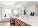 Bright bathroom features double sinks, a large mirror, and a separate tub and shower at 14363 W Acapulco Ln, Surprise, AZ 85379