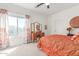 Comfortable bedroom features plush bedding, natural lighting, and a stylish vanity at 14363 W Acapulco Ln, Surprise, AZ 85379