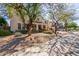 Lovely two-story home featuring mature trees, a welcoming front porch, and a spacious driveway at 14363 W Acapulco Ln, Surprise, AZ 85379