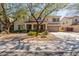 Inviting two-story home featuring a front porch, well-maintained landscaping, and a two-car garage at 14363 W Acapulco Ln, Surprise, AZ 85379