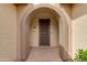 Welcoming covered entryway with a security door, offering both style and peace of mind at 15046 W Cooperstown Way, Surprise, AZ 85374