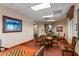 Community game room featuring tables, chairs, and pleasant decor, perfect for socializing at 15046 W Cooperstown Way, Surprise, AZ 85374