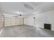 Spacious garage with overhead lighting and ample storage at 15046 W Cooperstown Way, Surprise, AZ 85374