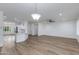 Open concept living room leads to the kitchen and dining areas at 15046 W Cooperstown Way, Surprise, AZ 85374