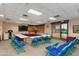 Well-equipped meeting room with a U-shaped table, comfortable seating, and modern amenities at 15046 W Cooperstown Way, Surprise, AZ 85374