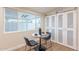 Breakfast nook with round table and sliding barn doors to pantry at 15255 N 5Th Ln, Phoenix, AZ 85023