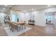 Bright dining room boasts wood floors, modern lighting, and stylish decor for comfortable gatherings at 15255 N 5Th Ln, Phoenix, AZ 85023