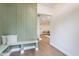 Inviting mud room offers board and batten detail and an entry into a living room at 15255 N 5Th Ln, Phoenix, AZ 85023
