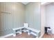 Mud room features a built-in bench with accent pillows and board and batten detail at 15255 N 5Th Ln, Phoenix, AZ 85023