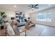 Living room featuring modern decor, an area rug, and an outdoor view at 15255 N 5Th Ln, Phoenix, AZ 85023