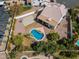 Expansive backyard featuring a pool, sports court, and plenty of space for entertaining at 16428 N 39Th Pl, Phoenix, AZ 85032