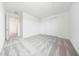 Neutral bedroom with plush patterned carpet and closet with sliding doors at 17264 W Via Dona Rd, Surprise, AZ 85387