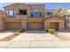 Charming townhouse featuring multiple car garages and lovely architecture at 19550 N Grayhawk Dr # 1044, Scottsdale, AZ 85255