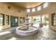 Community center featuring a multi-tiered fountain, decorative pillars, and landscaped areas at 19550 N Grayhawk Dr # 1044, Scottsdale, AZ 85255
