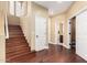 Hallway with beautiful wooden floors, staircase, and white doors at 19550 N Grayhawk Dr # 1044, Scottsdale, AZ 85255