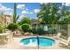 Inviting community hot tub area with a desert landscaped patio and plenty of seating on a sunny day at 19550 N Grayhawk Dr # 1044, Scottsdale, AZ 85255