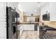 Spacious kitchen with stainless steel appliances and plenty of cabinet space at 19550 N Grayhawk Dr # 1044, Scottsdale, AZ 85255