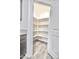 A view of a walk-in pantry with built-in shelves at 25437 W Mahoney Ave, Buckeye, AZ 85326