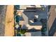 Aerial view of a home with a tile roof, desert landscaping, and a refreshing private pool at 25454 N 73Rd Ave, Peoria, AZ 85383