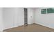 Bright bedroom with wood-look flooring, featuring a closet and a window at 2650 W Union Hills Dr # 51, Phoenix, AZ 85027