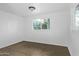 A bright bedroom with natural light, wood-look vinyl floors, and neutral paint at 2650 W Union Hills Dr # 51, Phoenix, AZ 85027