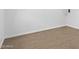 Clean and simple bedroom space with wood-look flooring and white trim at 2650 W Union Hills Dr # 51, Phoenix, AZ 85027